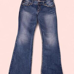 Silver Jeans Co. Suki low rise bootcut jeans with tan and brown stitching